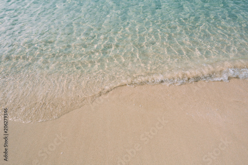 Beautiful background clean beach in summer. Royalty high-quality free stock image of seawater on the beach with sand and sunshine in summer 