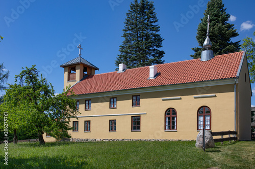 Old russian Philippians monastery in a polish Masuria. Summer, sunny day, blue sky above. Church in Wojnowo. photo