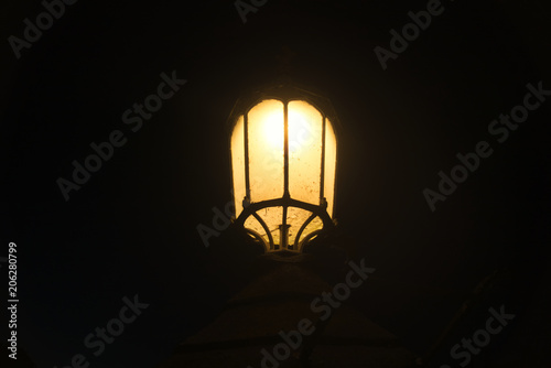 Lonely lantern in the darkness