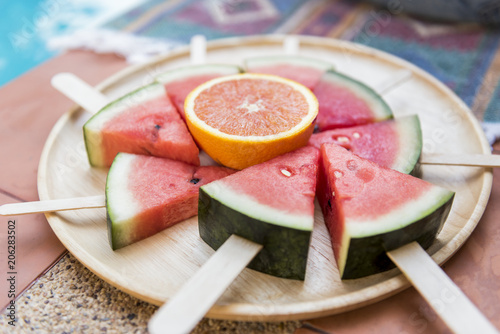 A dish of sliced watermelons