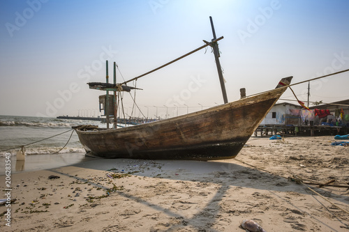 Fishing boat on the beach © chirawan_nt