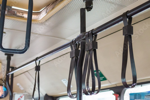 Handles for standing passenger inside a bus