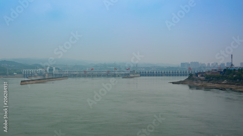 Distant view of the Three Gorges Dam over Yangtze river in Yichang China © Keitma