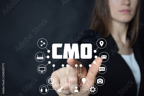 A businessman shows an inscription:CMO