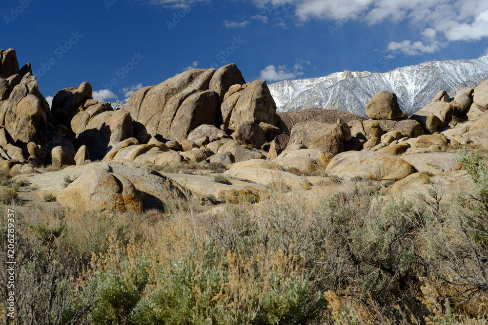 The Rugged spires and carved granite boulders of Alabama Hills outside of the Eastern Sierra Mountains and Mt Whitney Eastern California The Rugged spires and carved granite boulders of Alabama Hills outside of the Eastern Sierra Mountains and Mt Whitney Eastern California