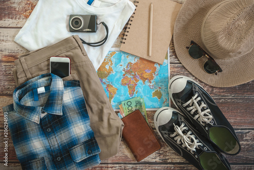 Traveler items vacation travel accessories holiday long weekend day off travelling stuff background concept style Overhead flat choice guide idea for planning travel around the world 