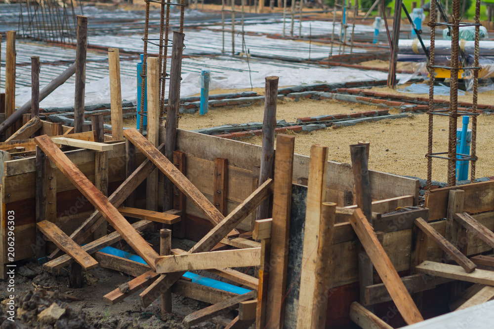 construction irons for building, stack of ribbed steel, person building house construction irons for building, stack of ribbed steel, person building house