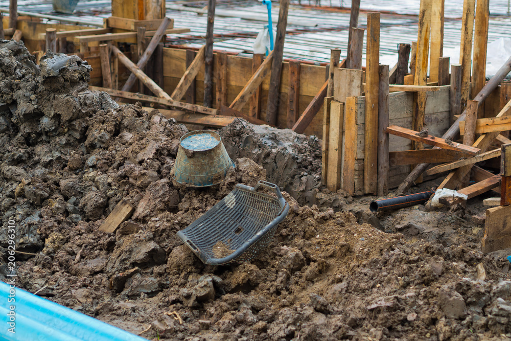 construction irons for building, stack of ribbed steel, person building house construction irons for building, stack of ribbed steel, person building house