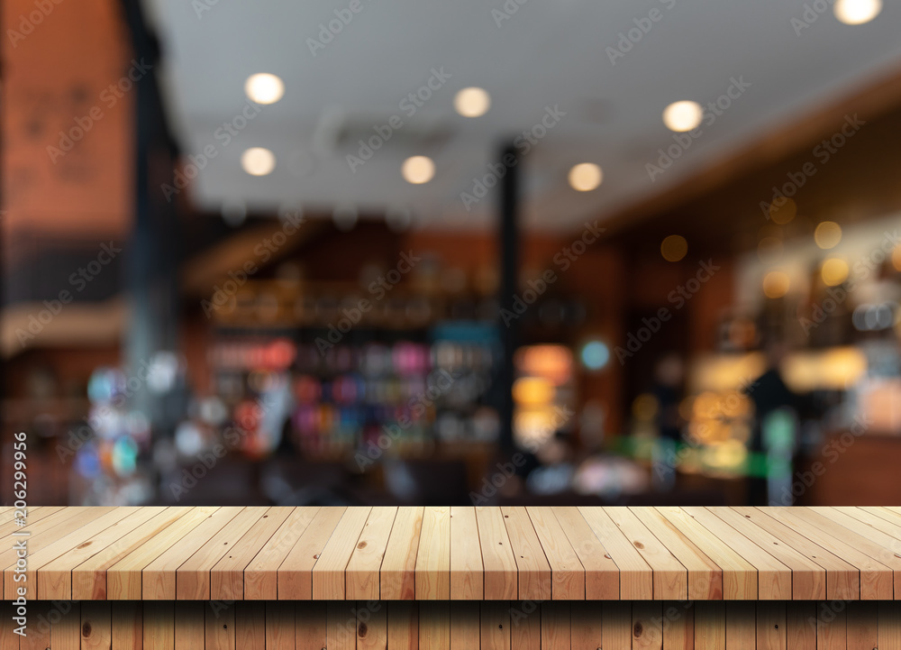 Wooden table on cafe background.For product display