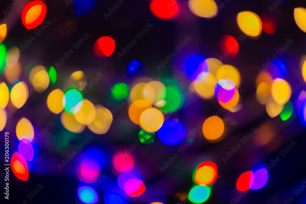 The Abstract background with shining bokeh multi colour image.