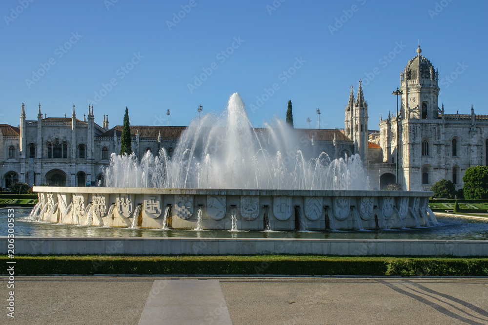 Fountain in front of Monastery of the Jeronimos in afternoon sun. Lisbon, Portugal