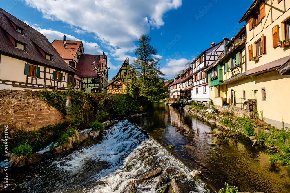 Weiss river in Kaysersberg, Alsace, on a sunny spring day