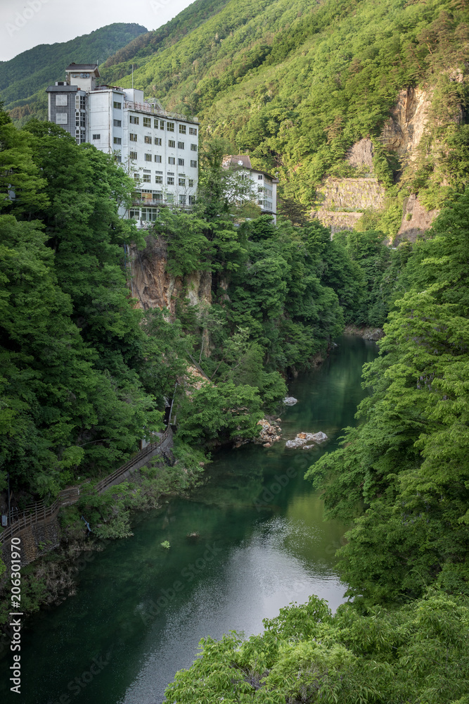 Resort hotel on the cliff side of a river