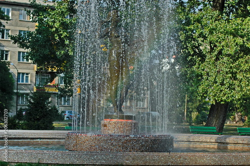 View of many fountain with different programme and rainbow  in the public Zaimov or Oborishte park  of  Sofia city, Bulgaria, Europe   photo