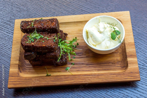 Garlic bread on wooden platter