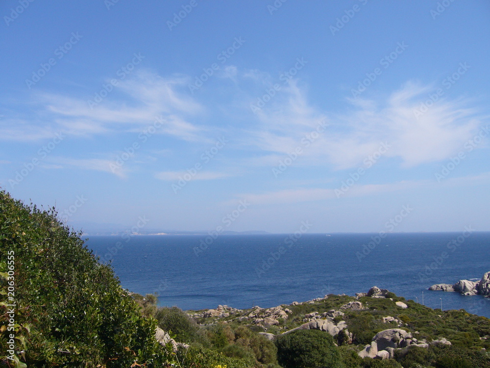 Blue sky and amazing sea, granite rocks with mediterranean vegetation, moon Valley, Valle della Luna, Capo Testa, Santa Teresa Gallura, Italy