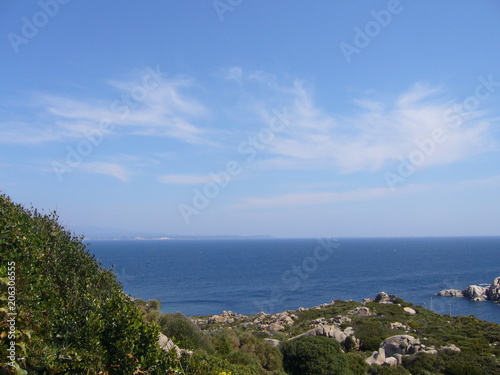 Fototapeta Naklejka Na Ścianę i Meble -  Blue sky and amazing sea, granite rocks with mediterranean vegetation, moon Valley, Valle della Luna, Capo Testa, Santa Teresa Gallura, Italy