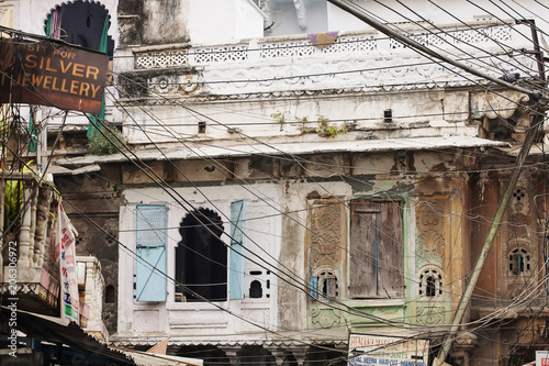 Udaipur city, Rajasthan, India, February 6, 2018: Udaipur city electricity in between architecture photo