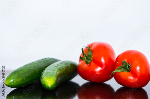 Tomatoes and cucumbers on the kitchen table