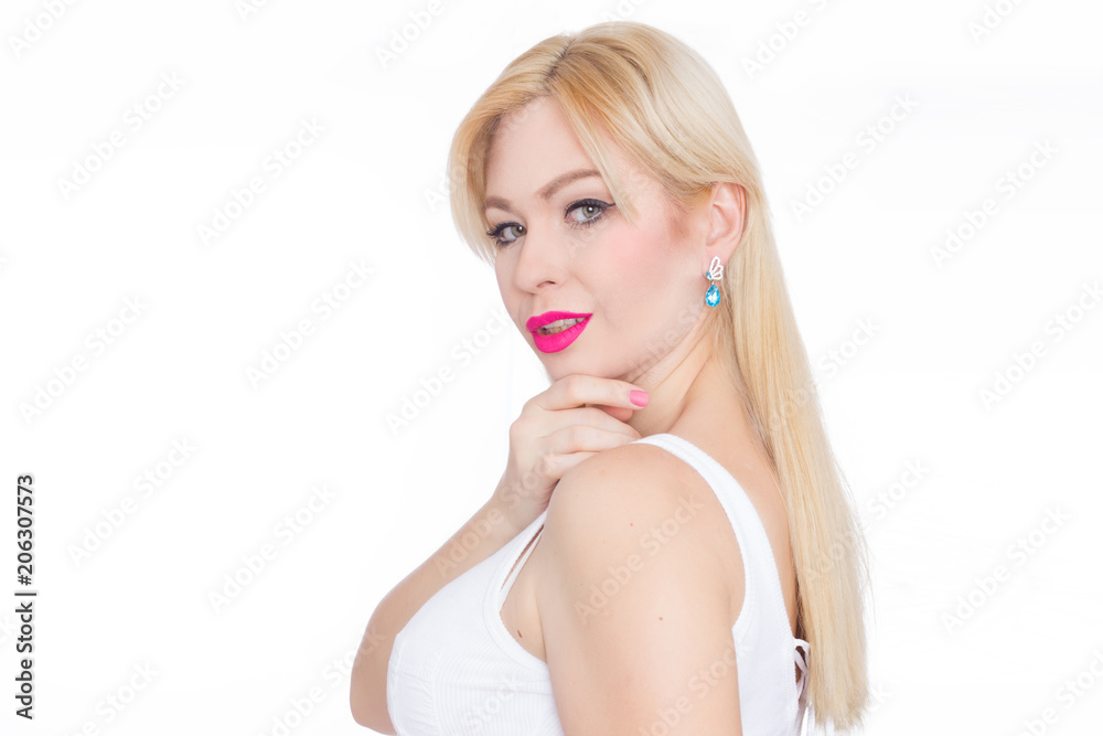 Close Up beauty portrait blonde with long hair, she with bright makeup, pink lips. Green eyes. Blue earrings. White background Close Up beauty portrait blonde with long hair, she with bright makeup, pink lips. Green eyes. Blue earrings. White background