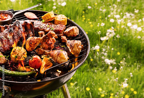 Vászonkép Summer barbecue cooking over a hot fire