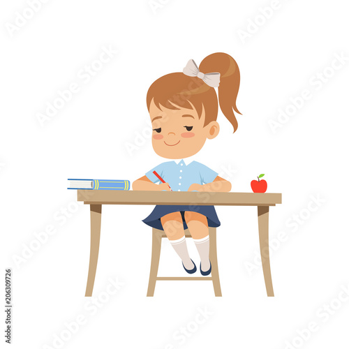 Cute girl sitting at the desk and writing, elementary school student in uniform vector Illustration on a white background