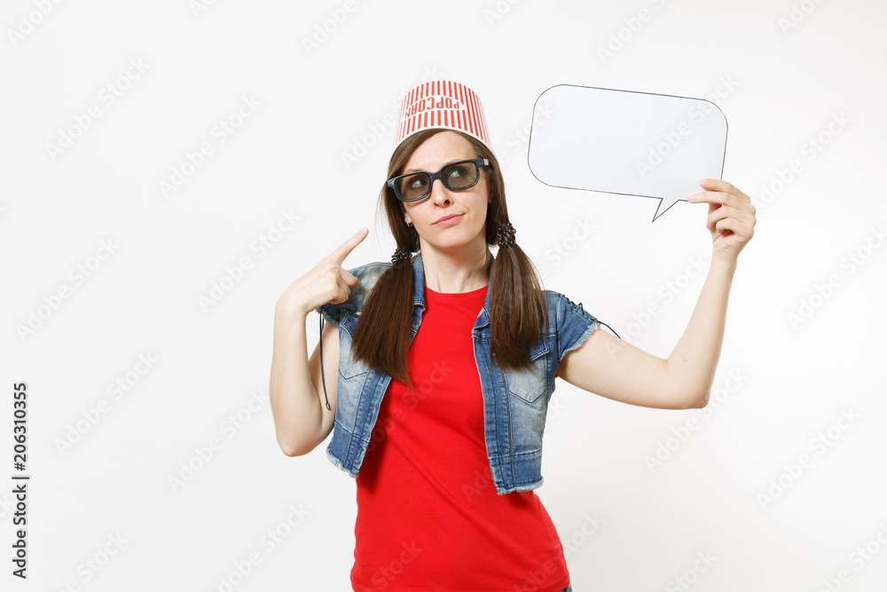Concerned woman in 3d glasses with bucket for popcorn on head watching movie film, poiting index finger on say cloud with place for text, copy space isolated on white background. Emotions in cinema. Concerned woman in 3d glasses with bucket for popcorn on head watching movie film, poiting index finger on say cloud with place for text, copy space isolated on white background. Emotions in cinema.