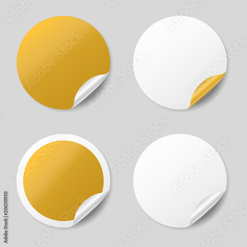 Blank gold round stickers with curled corners, realistic mockup