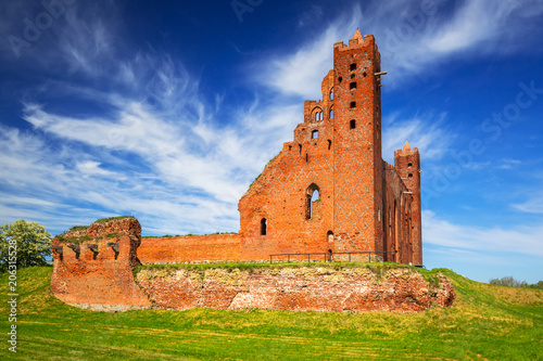 Ruins of medieval brick castle in Rydzyn Chelminski, Poland photo