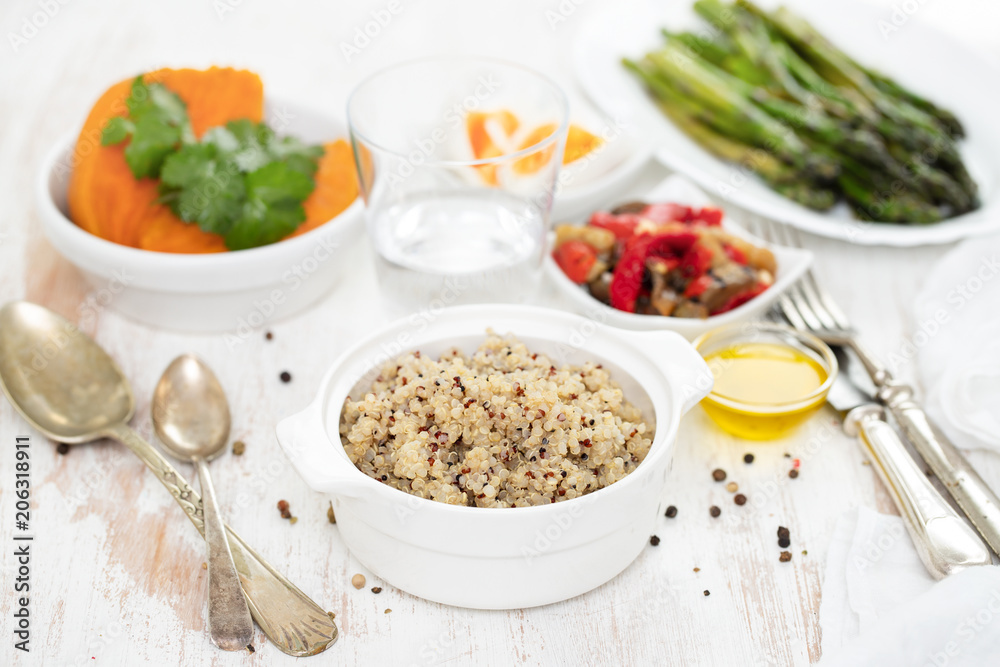 boiled quinoa and vegetables on white table boiled quinoa and vegetables on white table