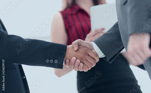 Businessmen handshaking after good deal. Business concept