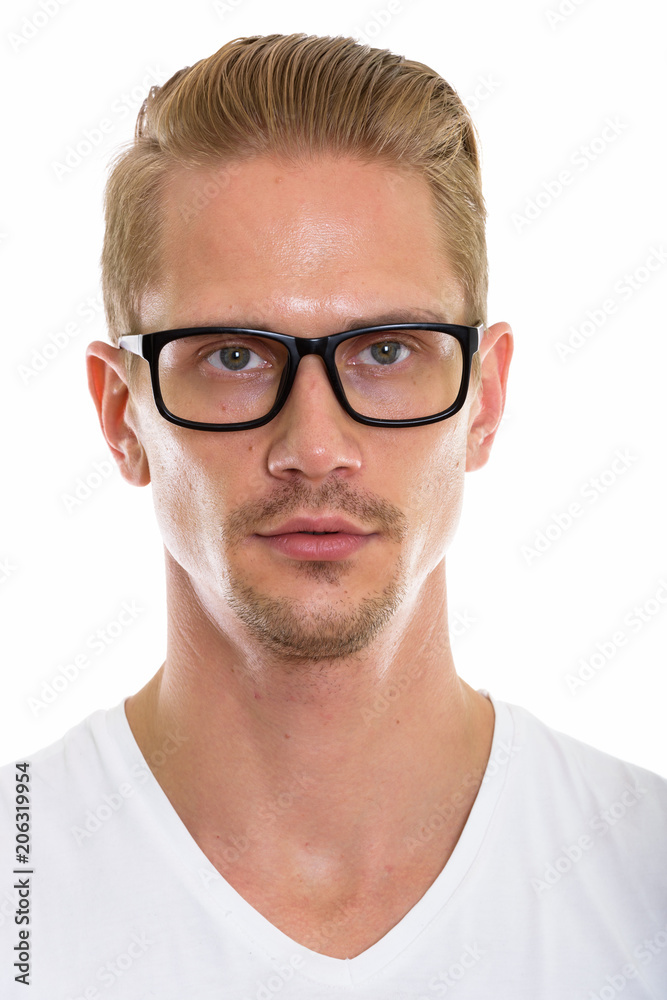 Face of young handsome man wearing eyeglasses Face of young handsome man wearing eyeglasses