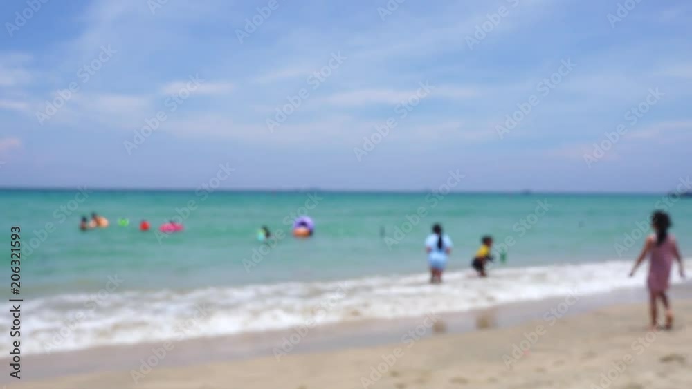 Children playing on the beach in vacation. Royalty high quality free stock image of children playing with friend on sand and beach in summer weather. The subject and background out of focus Children playing on the beach in vacation. Royalty high quality free stock image of children playing with friend on sand and beach in summer weather. The subject and background out of focus