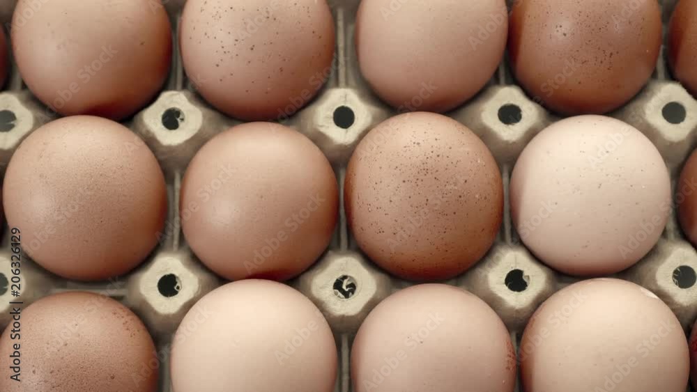 Brown eggs sliding shot close up Brown eggs sliding shot close up