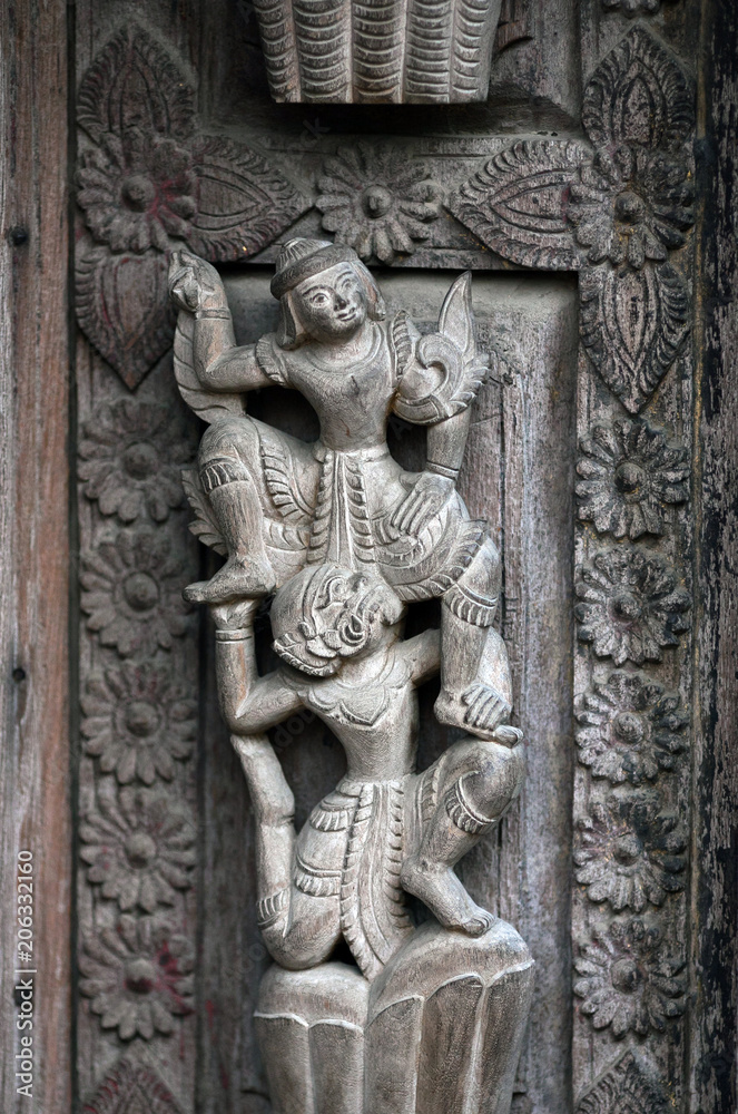 Ancient carved wooden figure at Shwe Nan Daw Kyaung, Myanmar