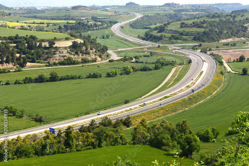 view of the ,Eix Transversal de Catalunya ,motorway from Montfalco Murallat, LLeida province, Catalonia, Spain photo