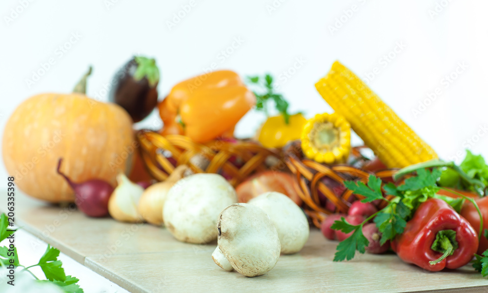 mushrooms on a background of fresh vegetables. mushrooms on a background of fresh vegetables.