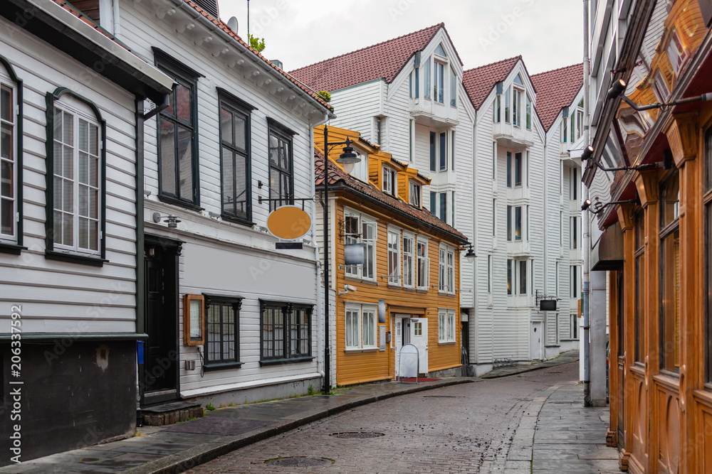Domestic street with wooden houses in the Gamle Stavanger - historical area of Stavanger city, Norway