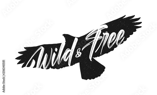 Vector illustration: Handwritten brush lettering of Wild and Free on silhouette of flying hawk background
