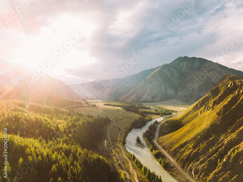 Sunset in the mountains. Valley of the Chuya River. Mountain river. Aerial landscape. Altai Republic, Siberia, Russia
