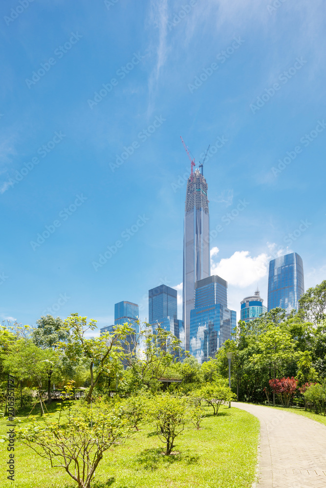 Fototapeta premium road of a modern city with skyscrapers as background