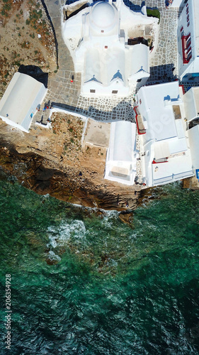 Aerial drone bird's eye view photo of iconic church of Paraportiani in Little Venice, Chora of Mykonos island, Cyclades, Greece