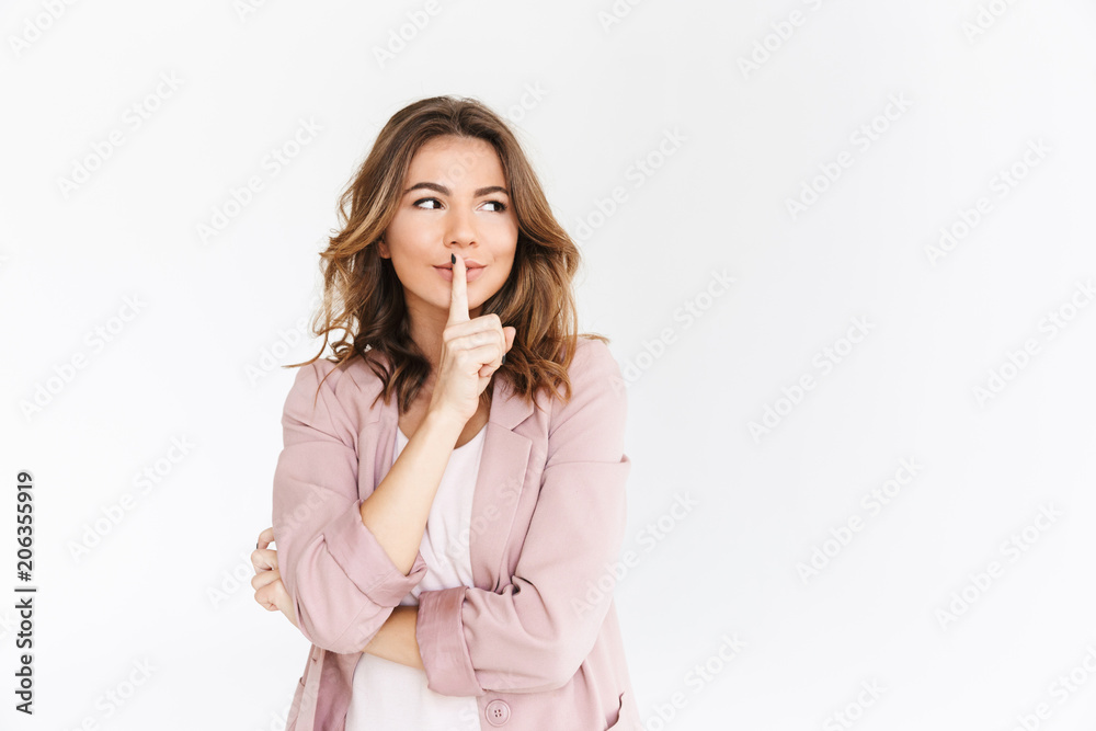 Young beautiful woman showing silence gesture. Young beautiful woman showing silence gesture.