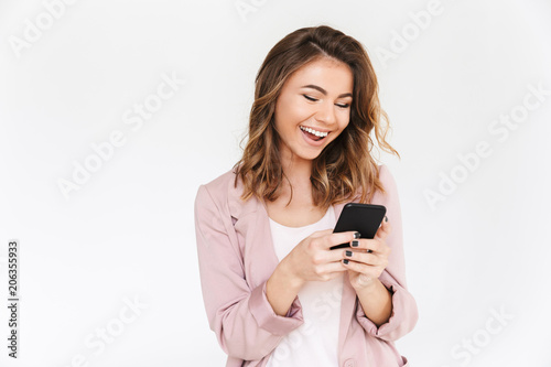 Young cute beautiful lady using mobile phone.
