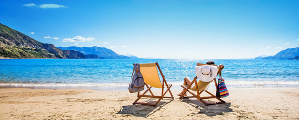 Woman enjoying sunbathing at beach