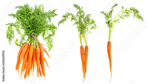Billede på lærred Carrot vegetable green leaves Food objects