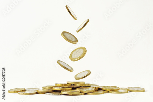 Falling euro coins on white background photo