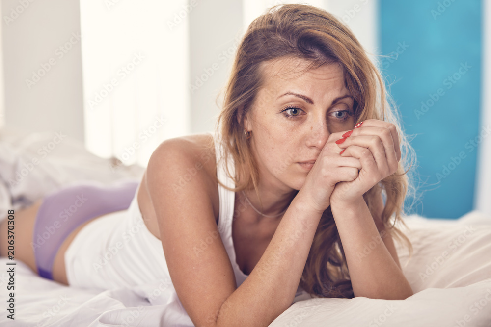 woman worries about something in the morning in the bed woman worries about something in the morning in the bed