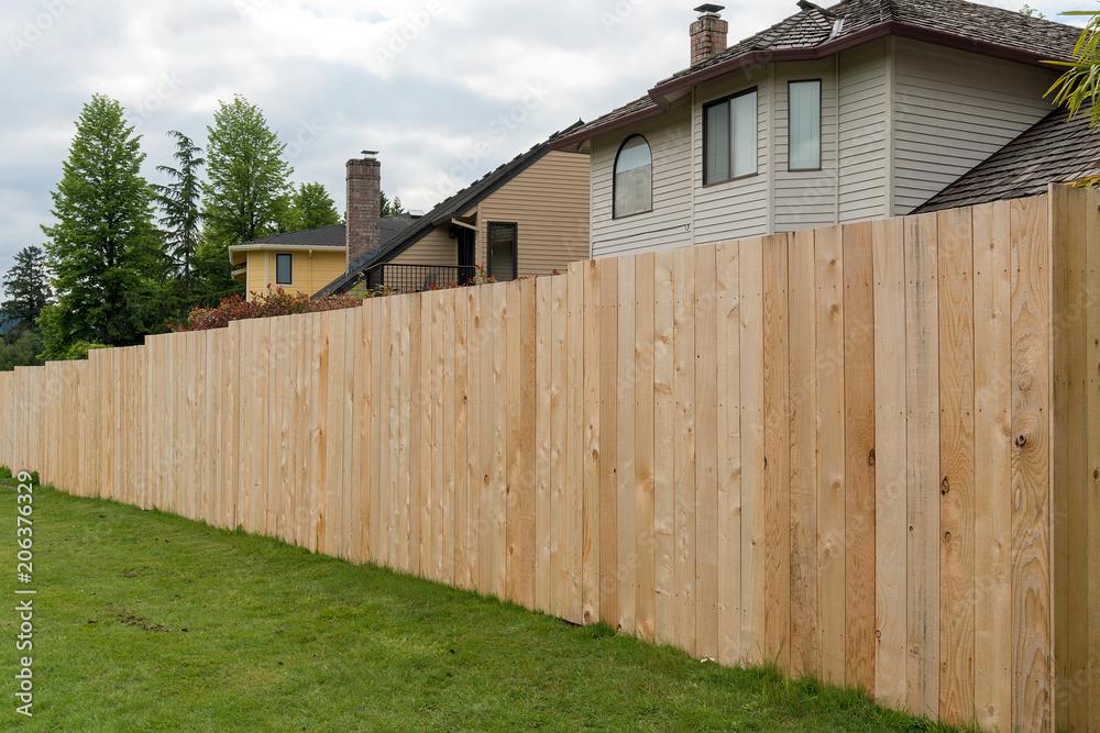 Cedar Wood Fencing along Home Backyard Cedar Wood Fencing along Home Backyard