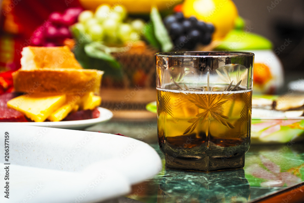 A glass of drink on the table with fruit A glass of drink on the table with fruit